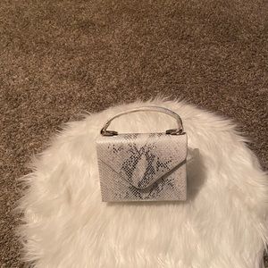 White animal print purse